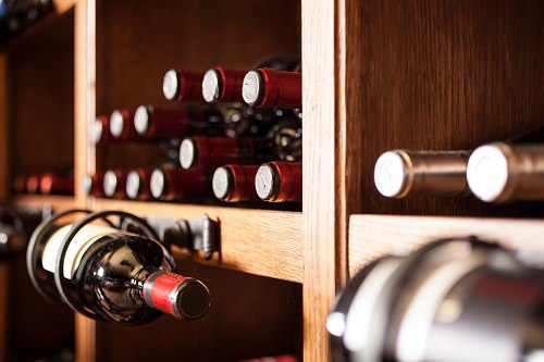 Setting up wine bottles as guest books