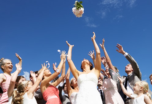 Tossing the bridal bouquet