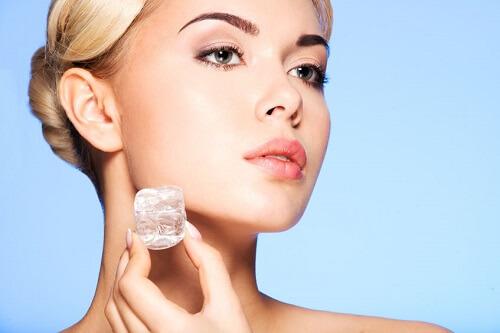 Use ice to reduce redness