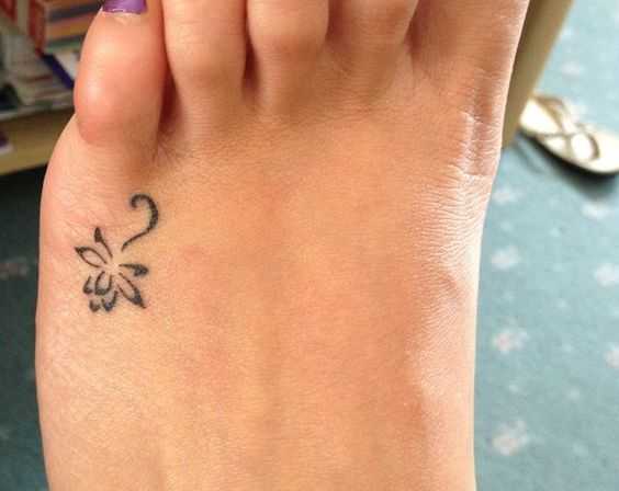 Simple symbols tattoo