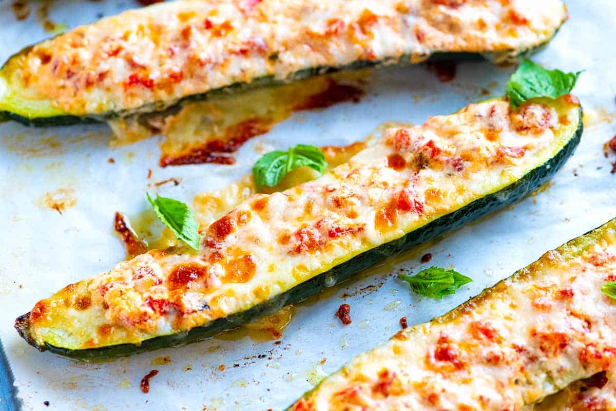 Zucchini stuffed with mozzarella cheese and tomatoes