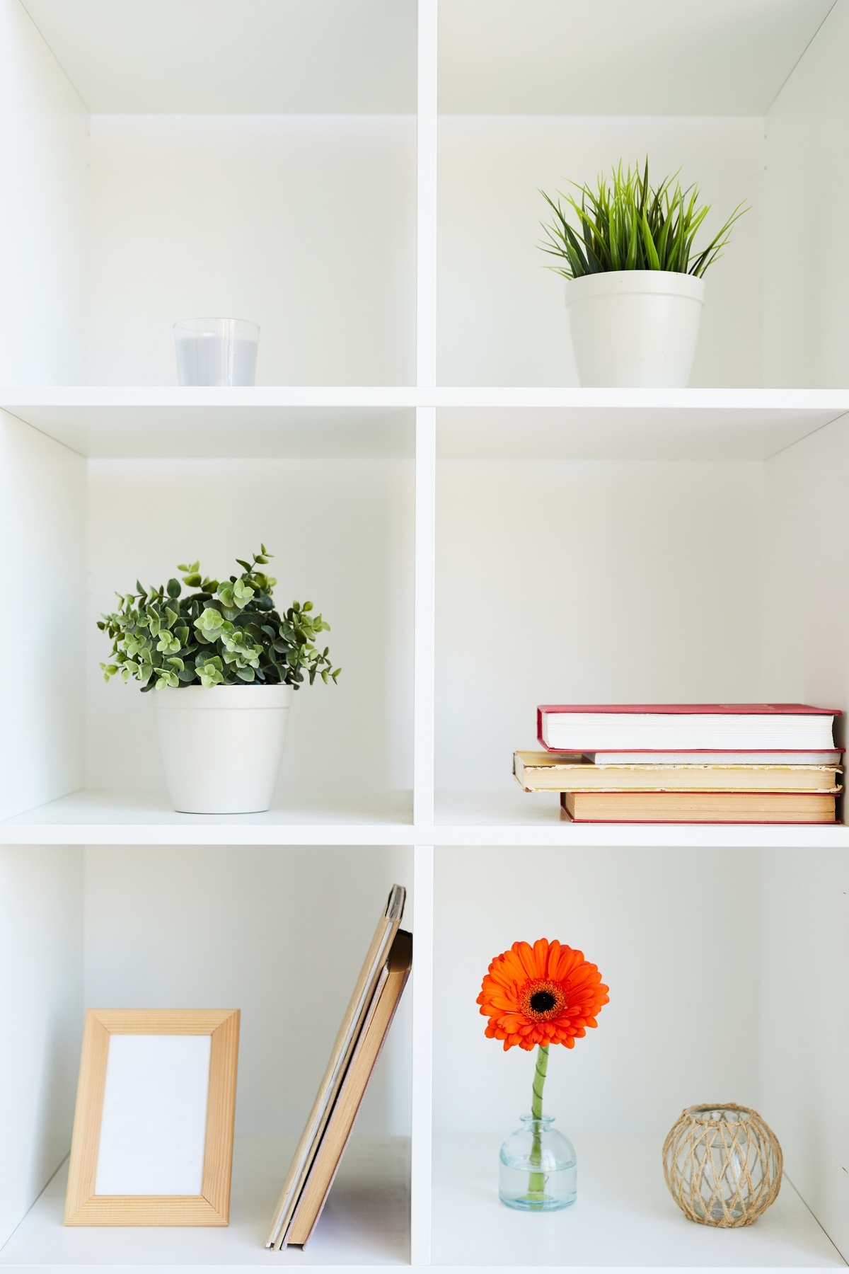 Add Artwork to Your Shelves 10 DIY Ways to Decorate Your Bookcase