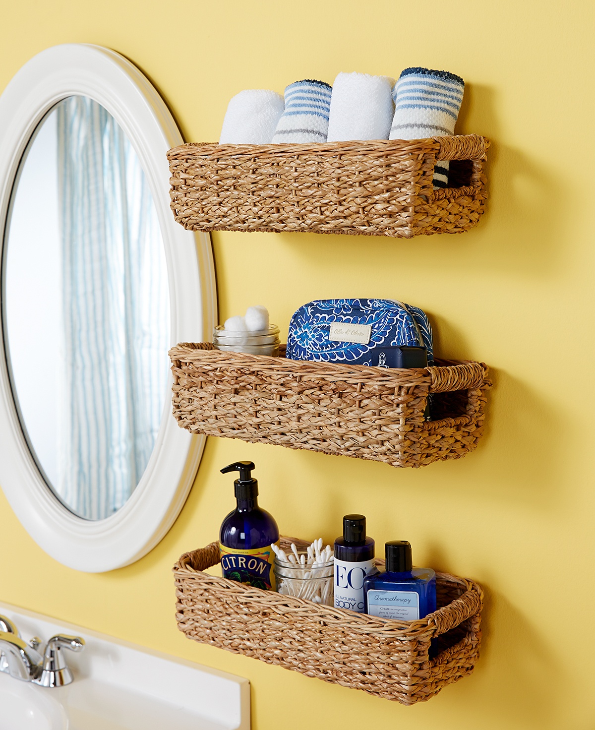 Turn an old basket into a towel organizer