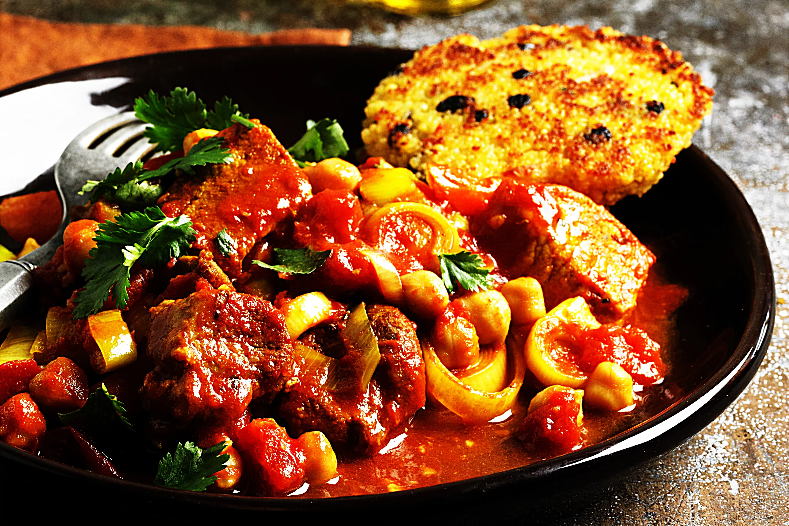 Moroccan-Inspired Country-Style Rib Ragu with Couscous Cakes
