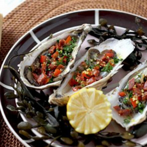 Fresh Oysters Topped with Chorizo Dressing