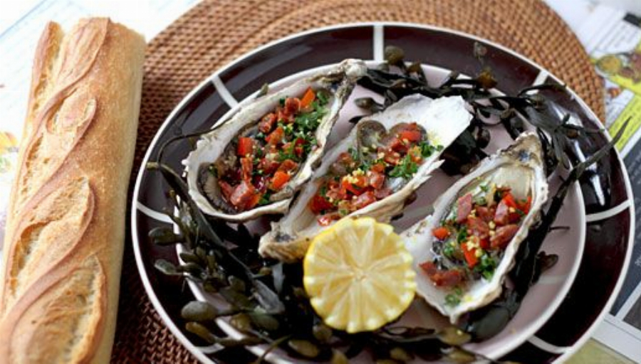 Fresh Oysters Topped with Chorizo Dressing