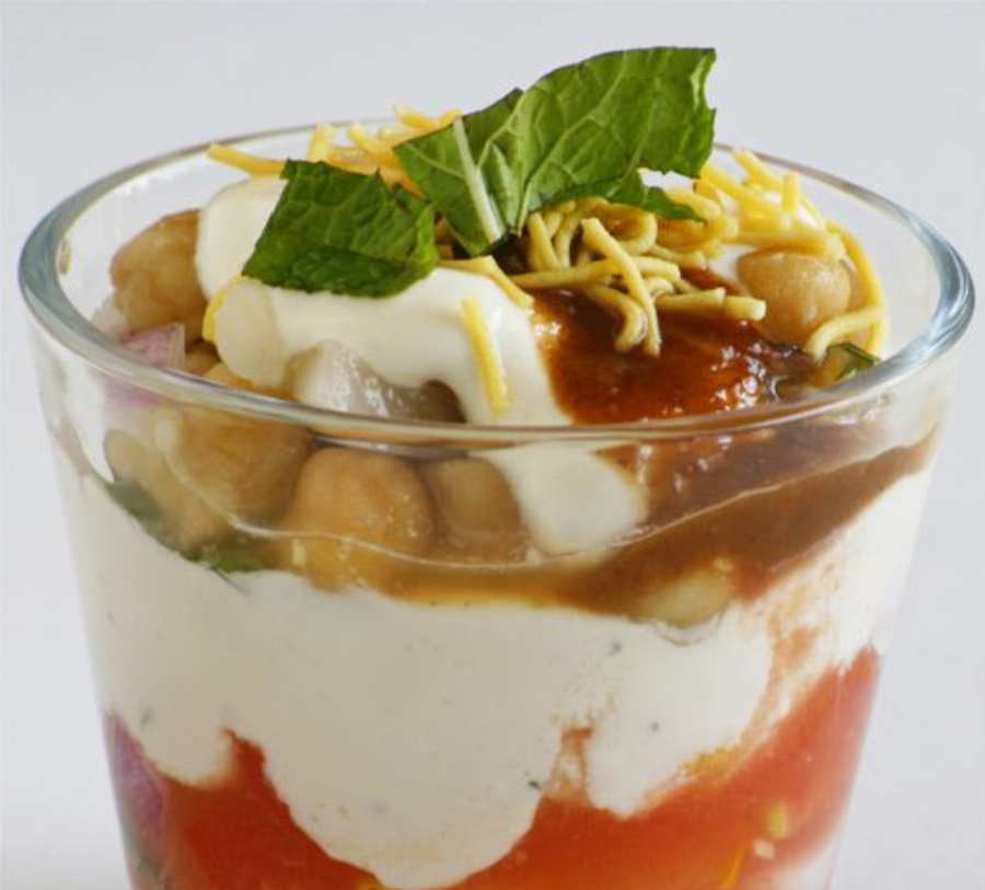 Punjabi-Style Chaat (Layers of Tomatoes, Raita, Ginger Garbanzo beans, Mint Sauce and Tamarind Chutney)