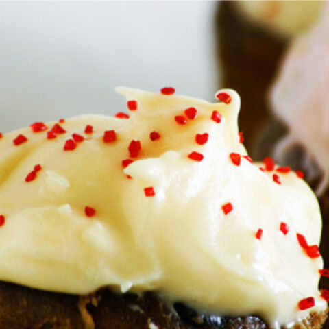 Double Chocolate Madeleine Tea Cakes with Mango Cream Cheese Frosting