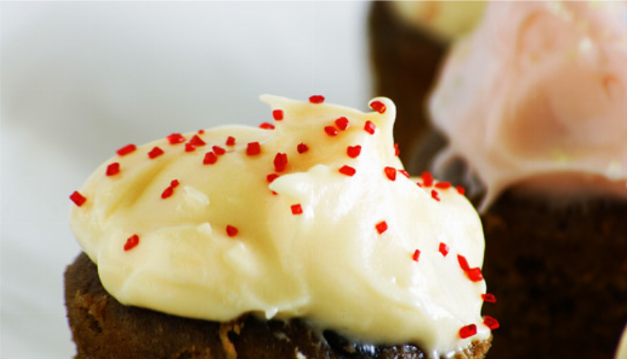 Double Chocolate Madeleine Tea Cakes with Mango Cream Cheese Frosting