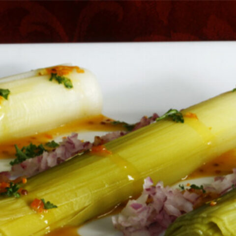 Leeks served with a Kumquat Clementine Vinaigrette