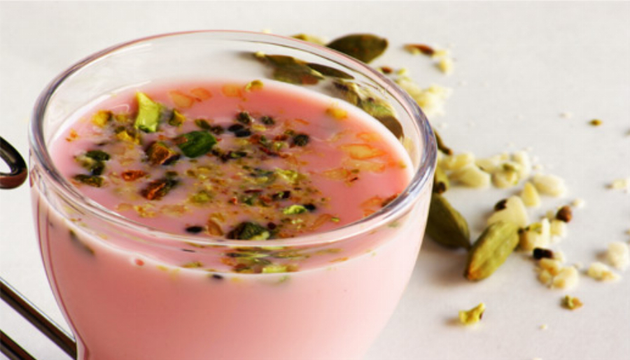 Sharbat (Indian Milk Drink made with Rooh Afza Syrup, Cardamom Seeds, Almonds, Cashews and Pistachios)